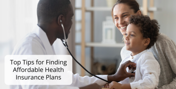 A doctor is listening to a child 's heart with a stethoscope.