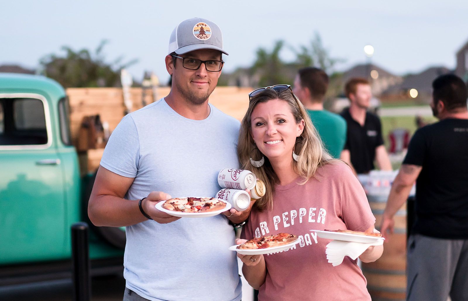Couple Eating and Smiling at Outdoor Event | Morningstar Homes