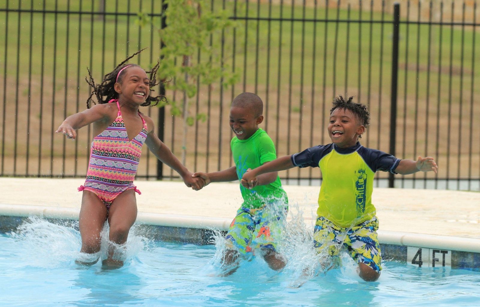 Children Jumping Into Pool | Morningstar Homes