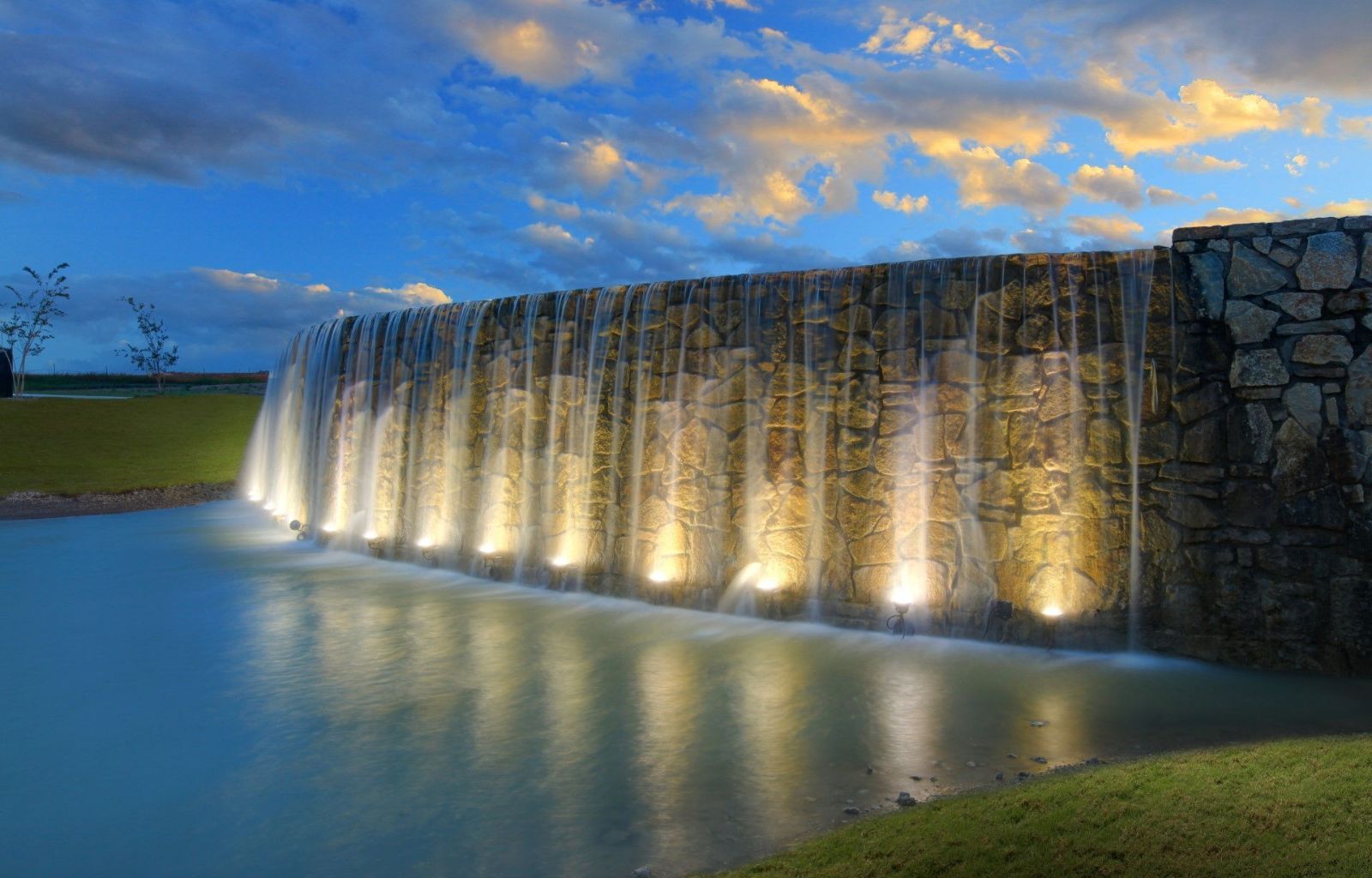 Waterfall Lit Up At Sunset | Morningstar Homes