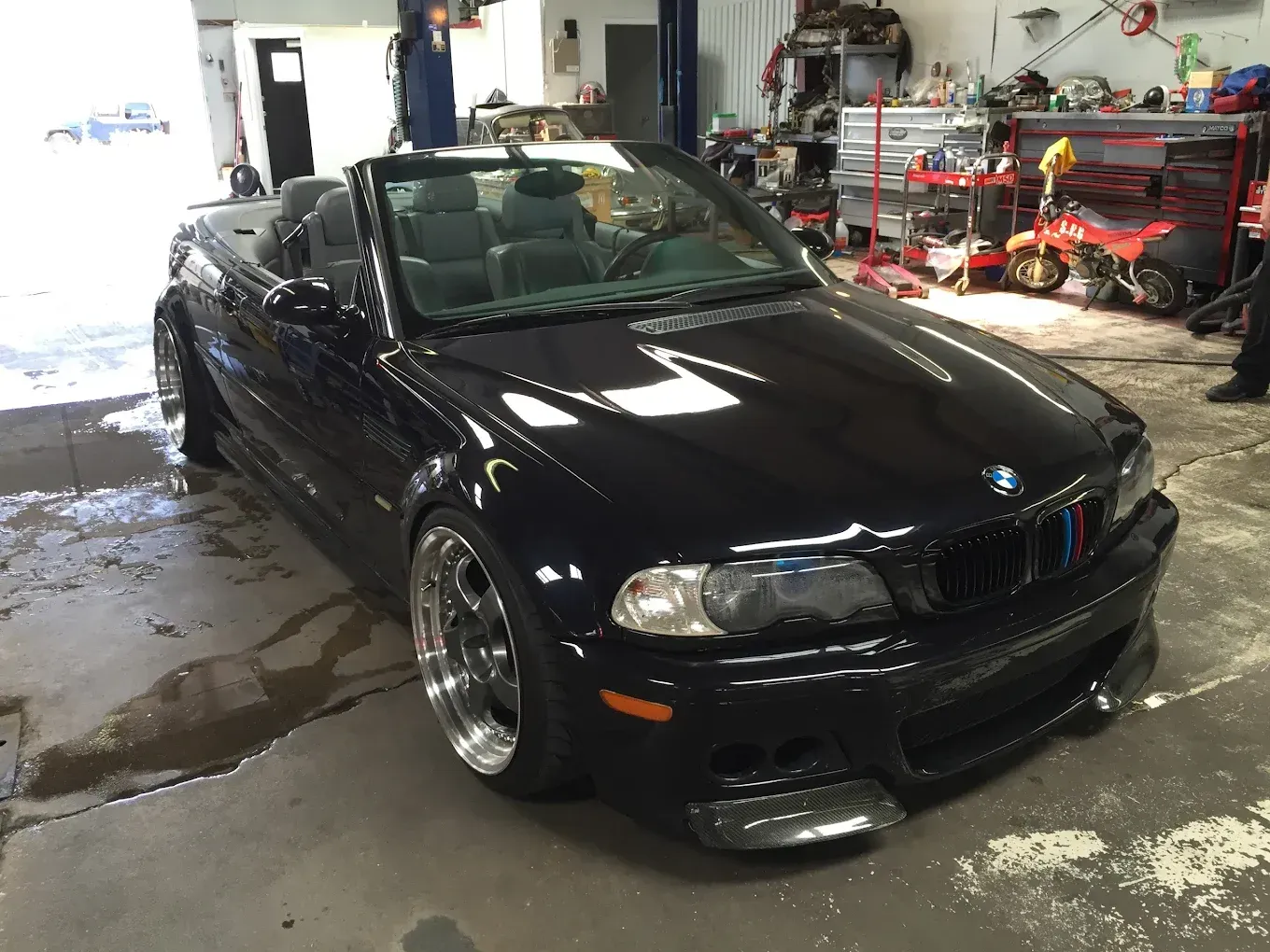 Black Car Parked Inside | Cutting Edge Automotive LLC