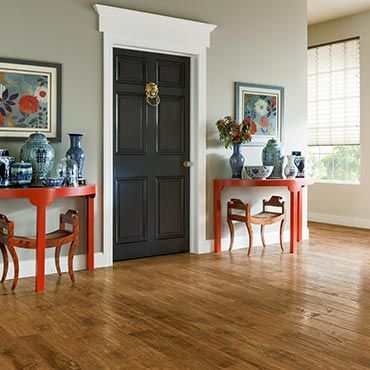 Red Table With Flower Vase — Ypsilanti, MI — Carpet Center & Floors