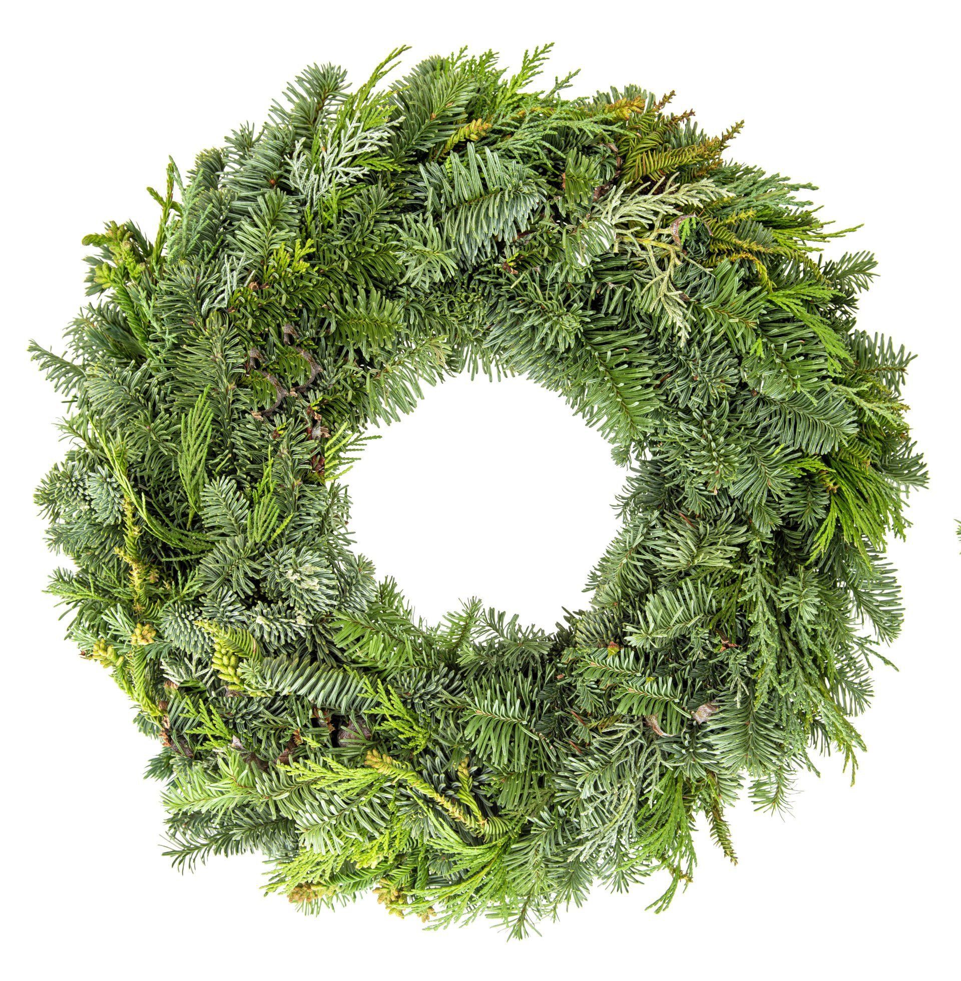 A christmas wreath with a hole in the middle on a white background.