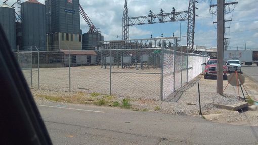 8 ft  chain link with 1 ft barbwire . Washington avenue substation in west plains Missouri