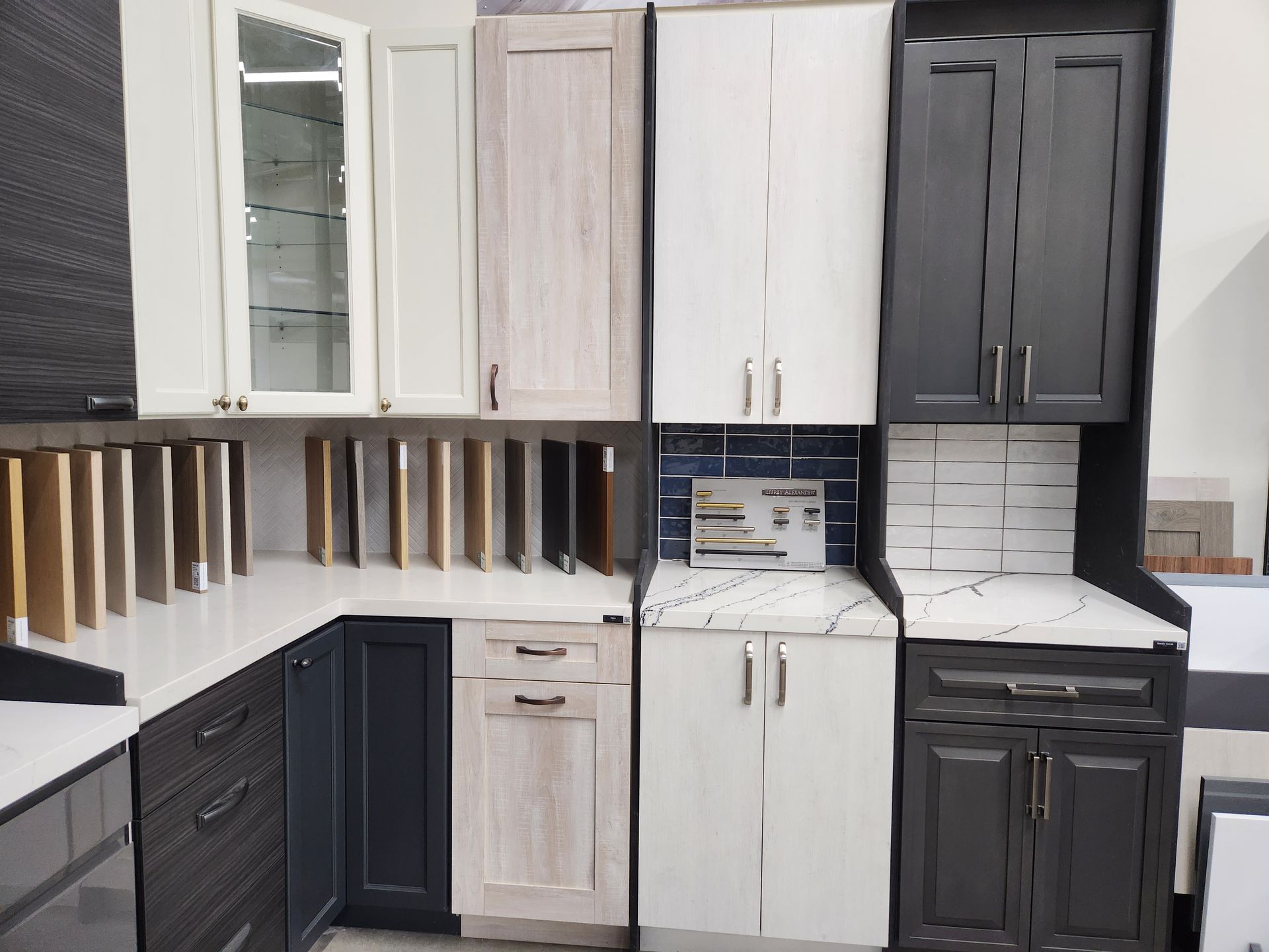 A kitchen with a lot of cabinets and counter tops.