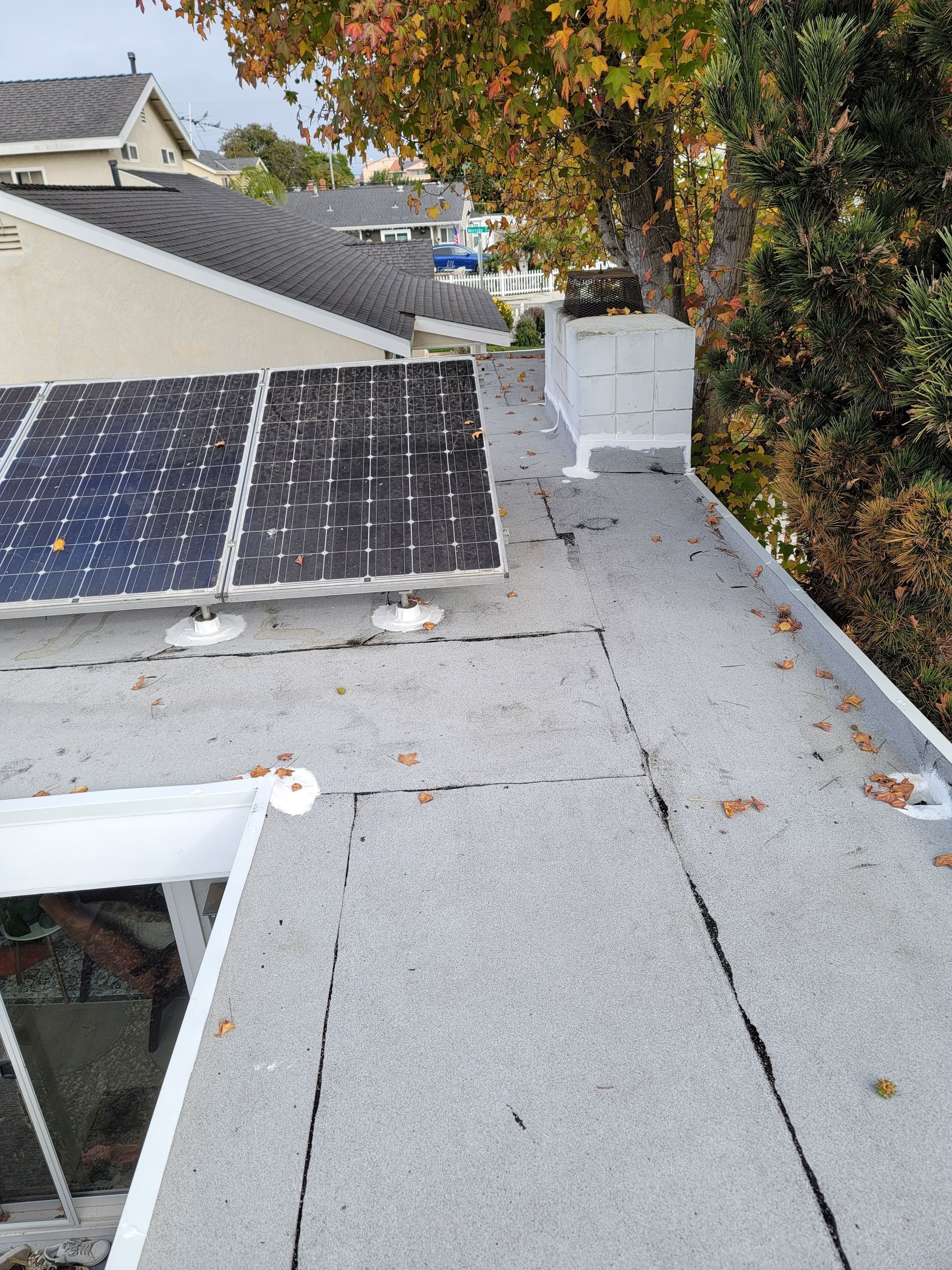 A roof with a lot of solar panels on it