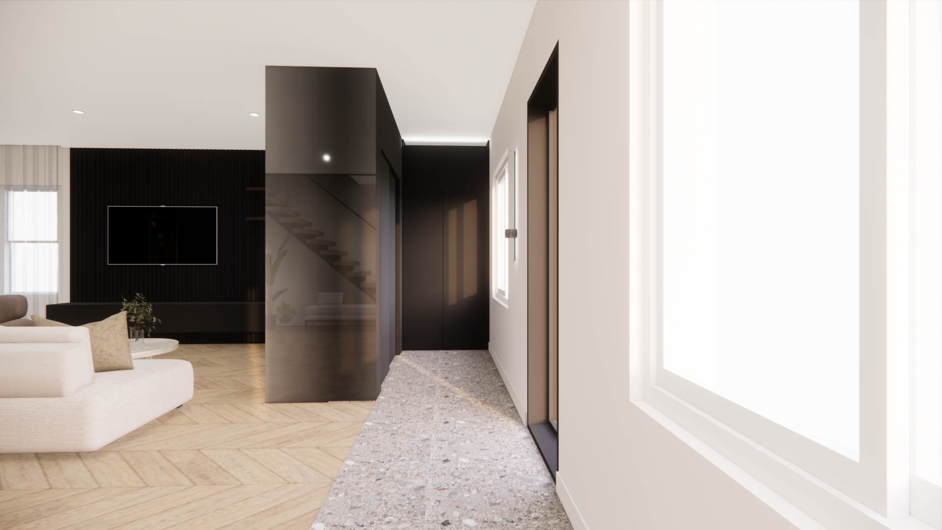 Modern interior with white sofa, black accent wall, and stone floor leading to hallway.