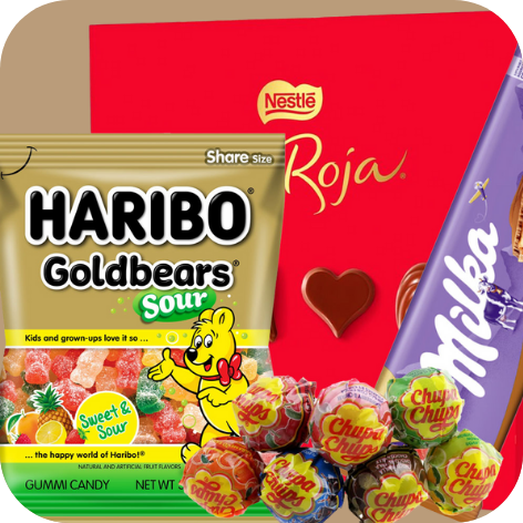 Una bolsa de haribo goldbears sour, chupa chups y chocolate milka.