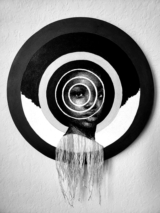 Black and white artwork: a person's face centered inside concentric circles. Below is fringe, suggesting fabric.