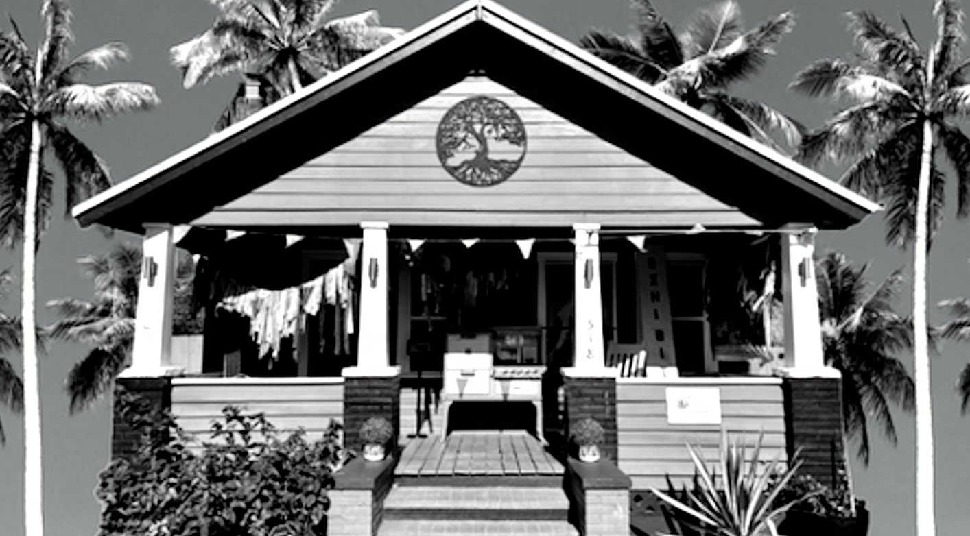 Black and white image of a small house with a porch, palm trees, and a tree logo above the entrance.