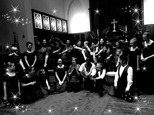 Choir group in a church. People kneel, stand, and gesture. Black and white photo with star-like sparkles.
