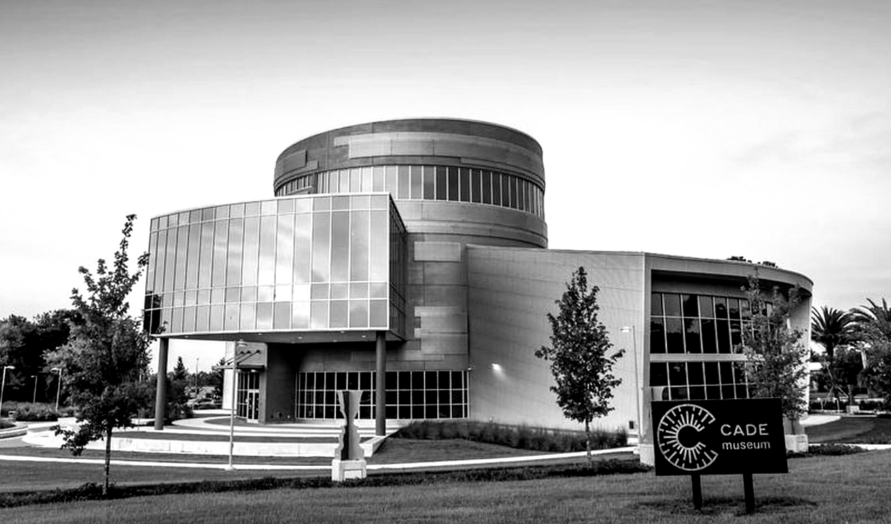 A modern building with a cylindrical top, 