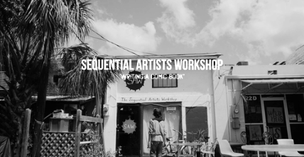 Black and white photo of storefront 