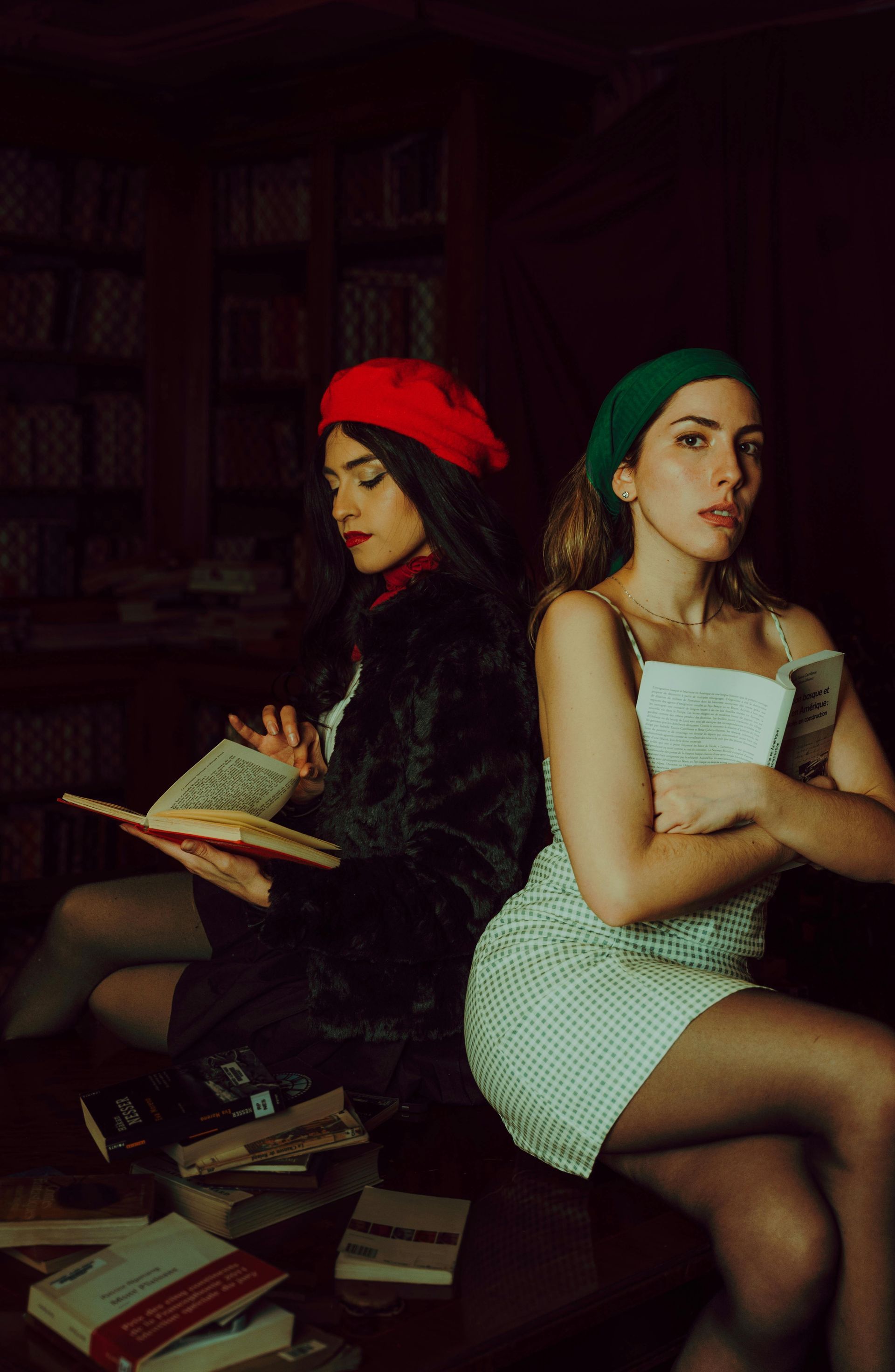 Outdoor artisan market with tents, tables, and vendors selling goods on a sunny day.