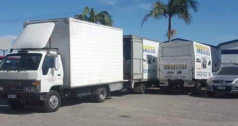 transportation truck parked next to each other