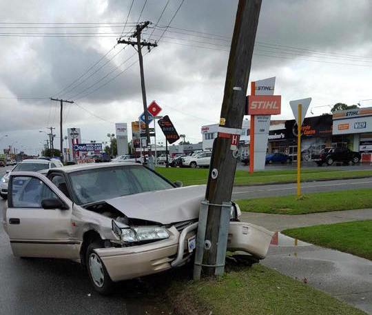 car crashed into a pole