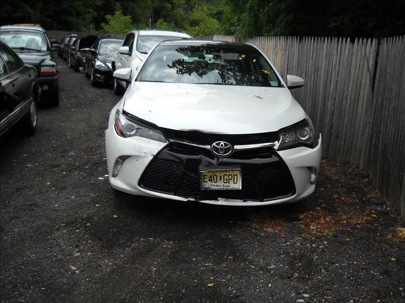 Cars — Wrecked White Car in Lakewood, NJ