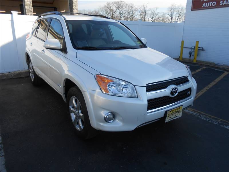 Emergency Towing — Side View Shots Of White Car in Lakewood, NJ