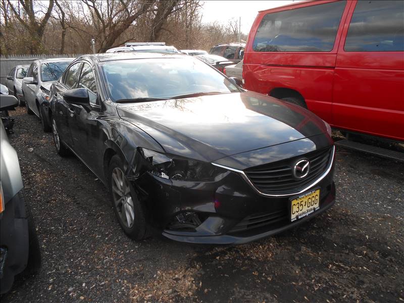 Towing — Side View Shots Of Black Car With Damage In Front View in Lakewood, NJ