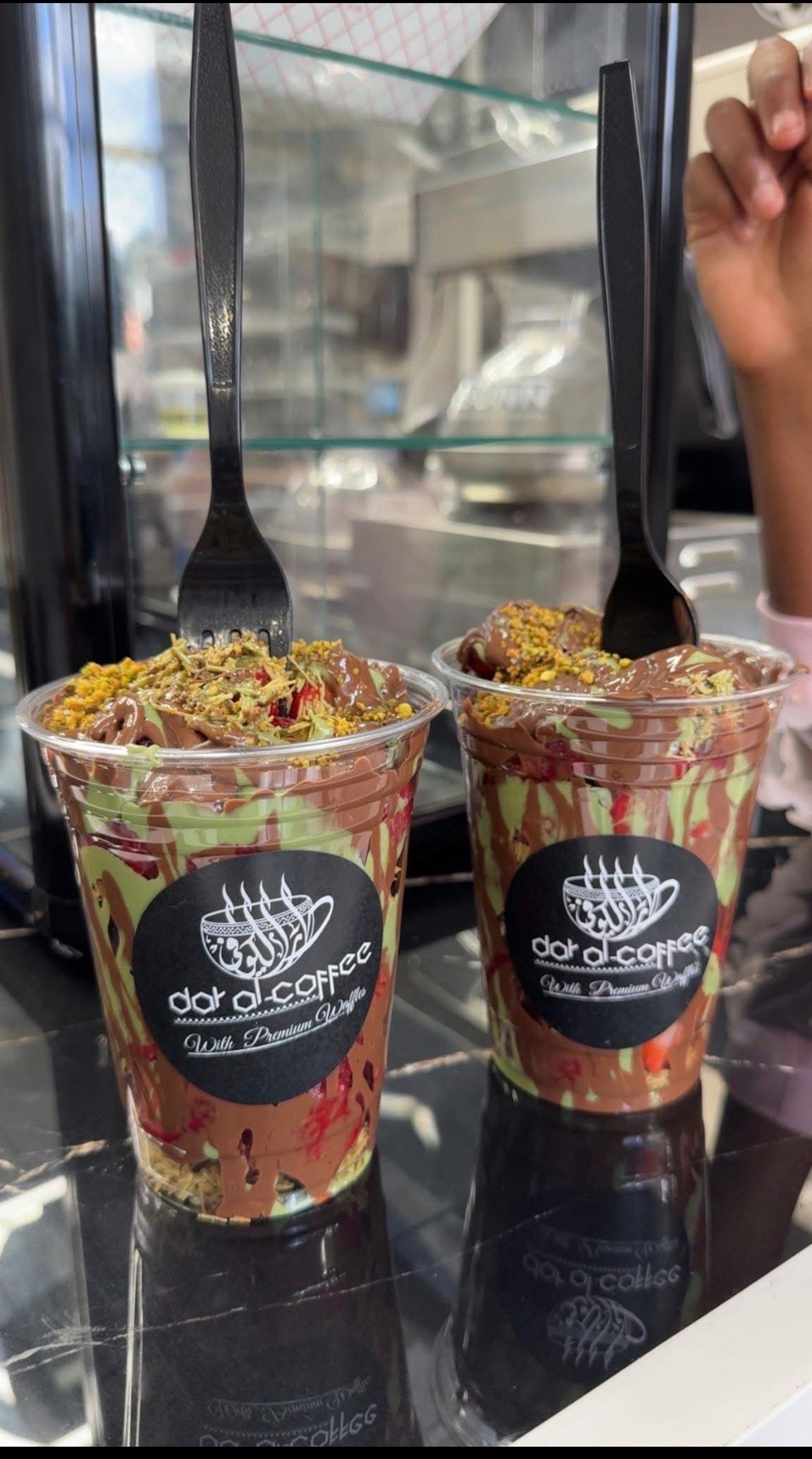 A tray of coffee cups and saucers on a table.