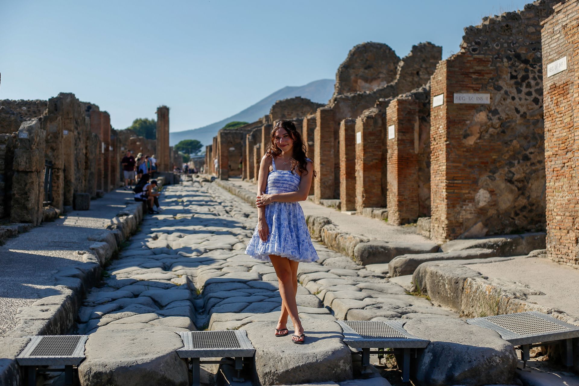 Couple walking among the ruins of Pompeii – Historic Photography Session.
