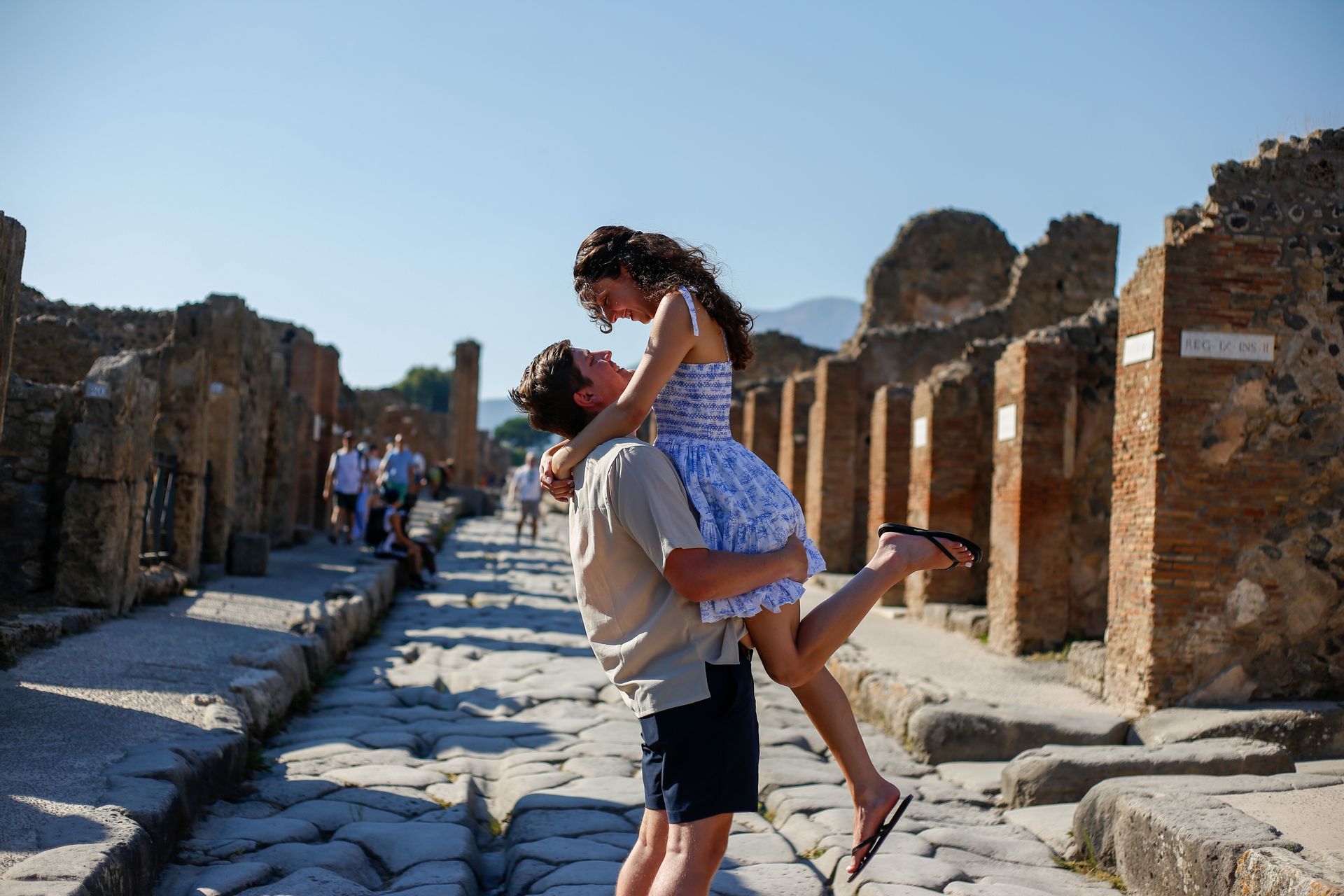 Couple in love walking among the ruins of Pompeii – Historic Photography.