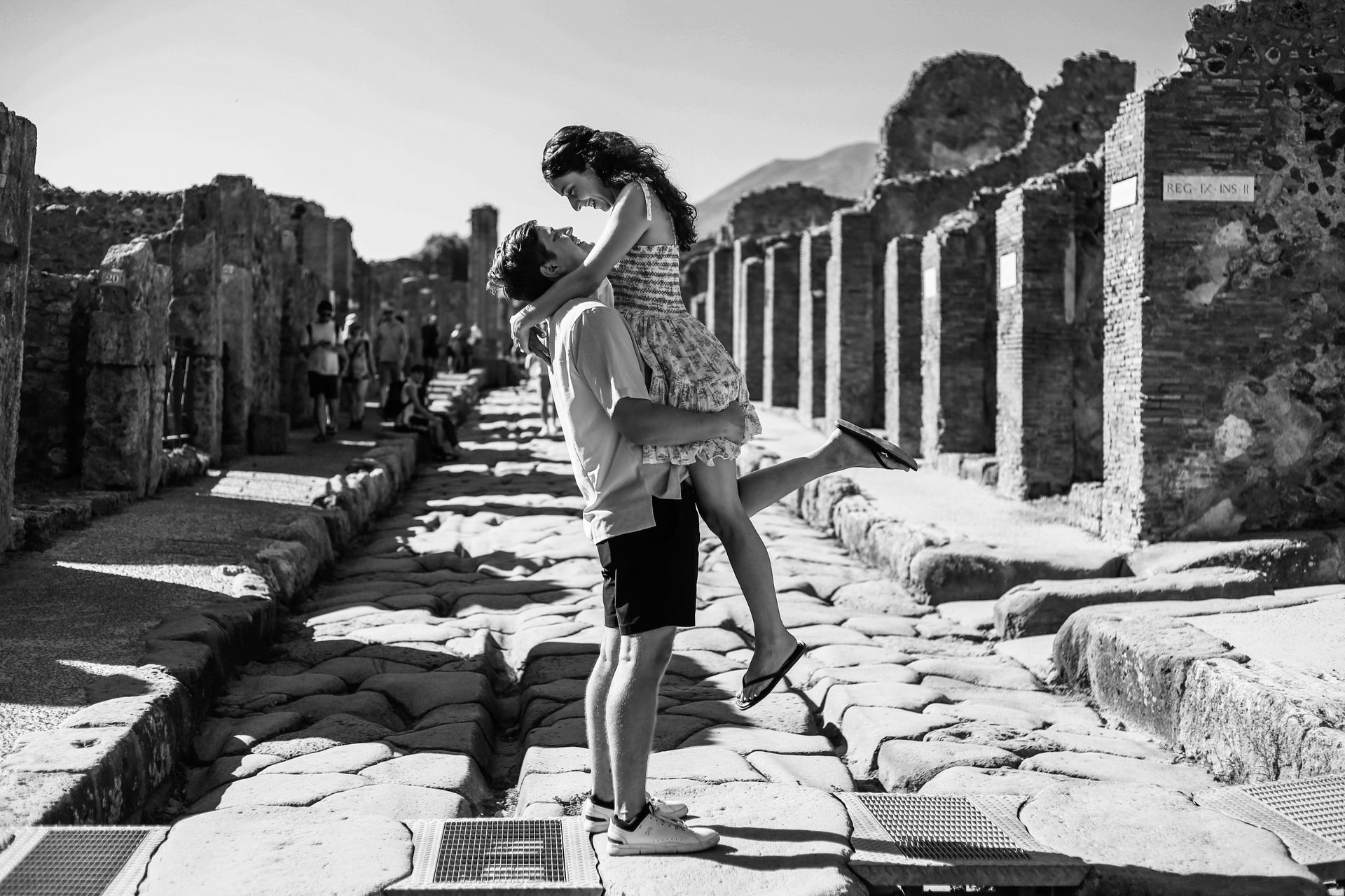 Couple walking among the ruins of Pompeii – Historic Photography Session.