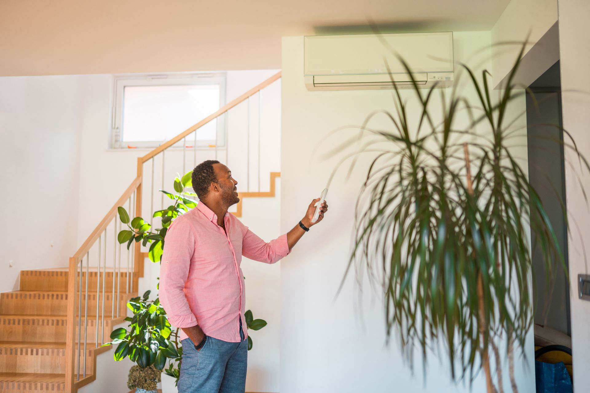 Home owner remote controlling AC unit in Miami, FL.