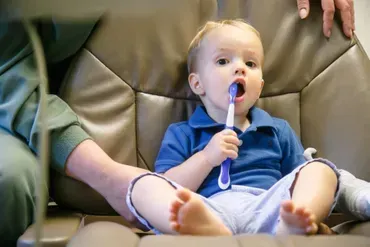 Young child with a toothbrush