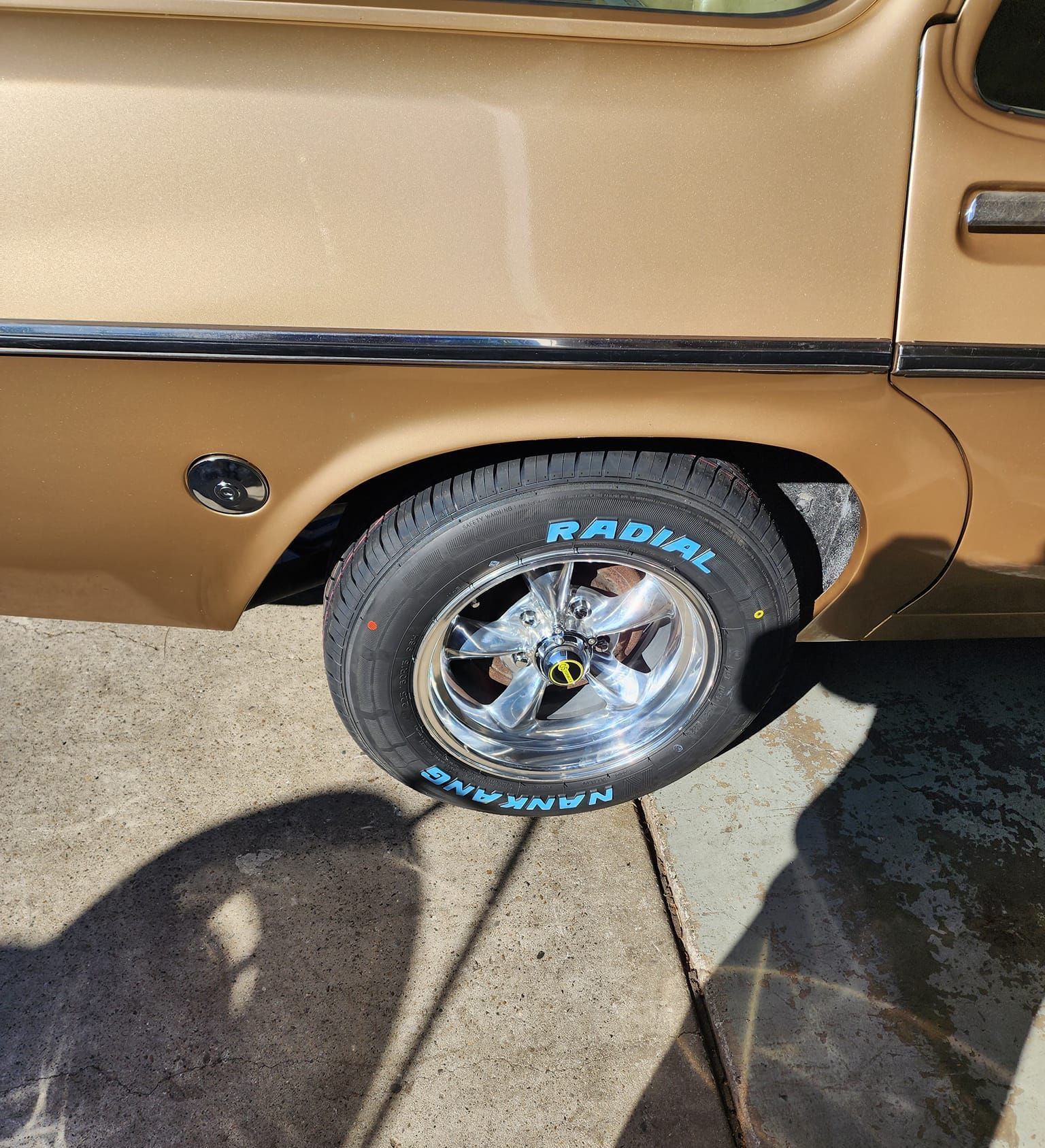A Close up Of a Car Wheel on A Parking Lot — Budget Tyre Shed In Charmhaven, NSW