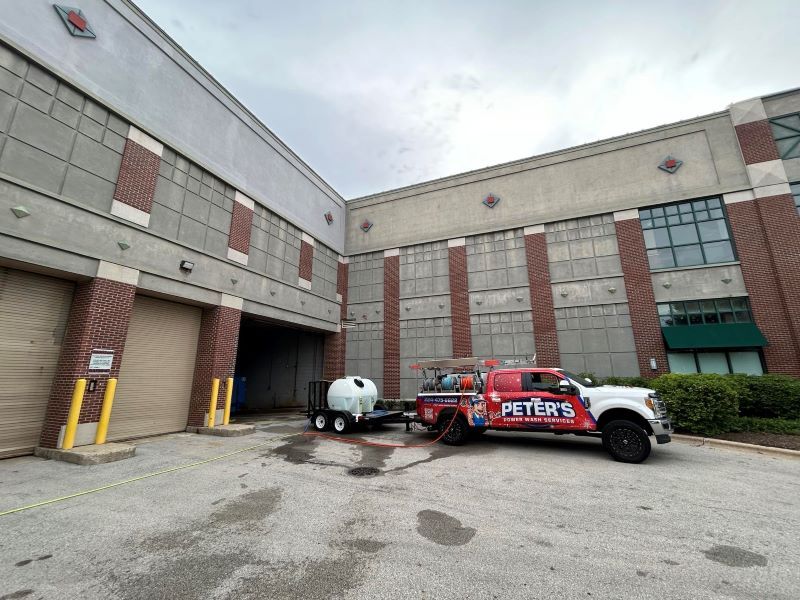 Image of a power washing job for a warehouse. 