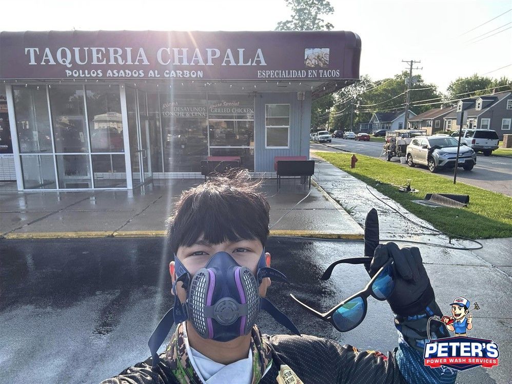Image of Peter's Power Wash Service performing a commercial pressure washing service in Glenco, IL