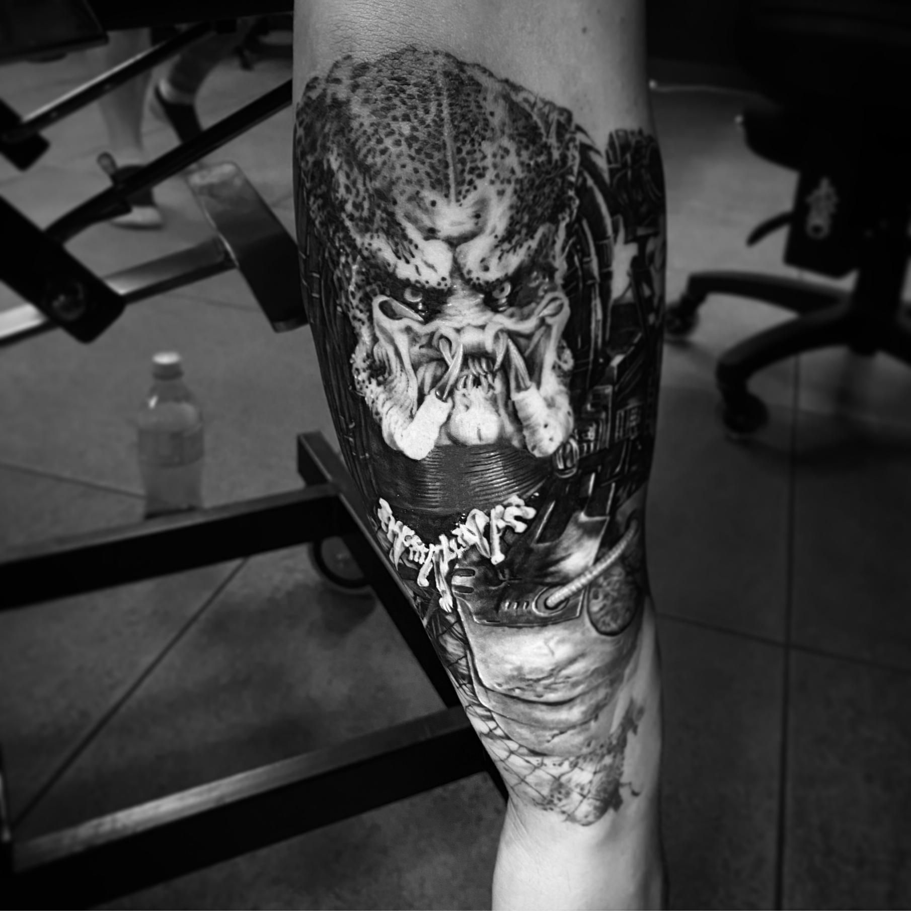 A Leg Tattoo Featuring a Man With a Skull — Gallery Tattoo in Medowie, NSW