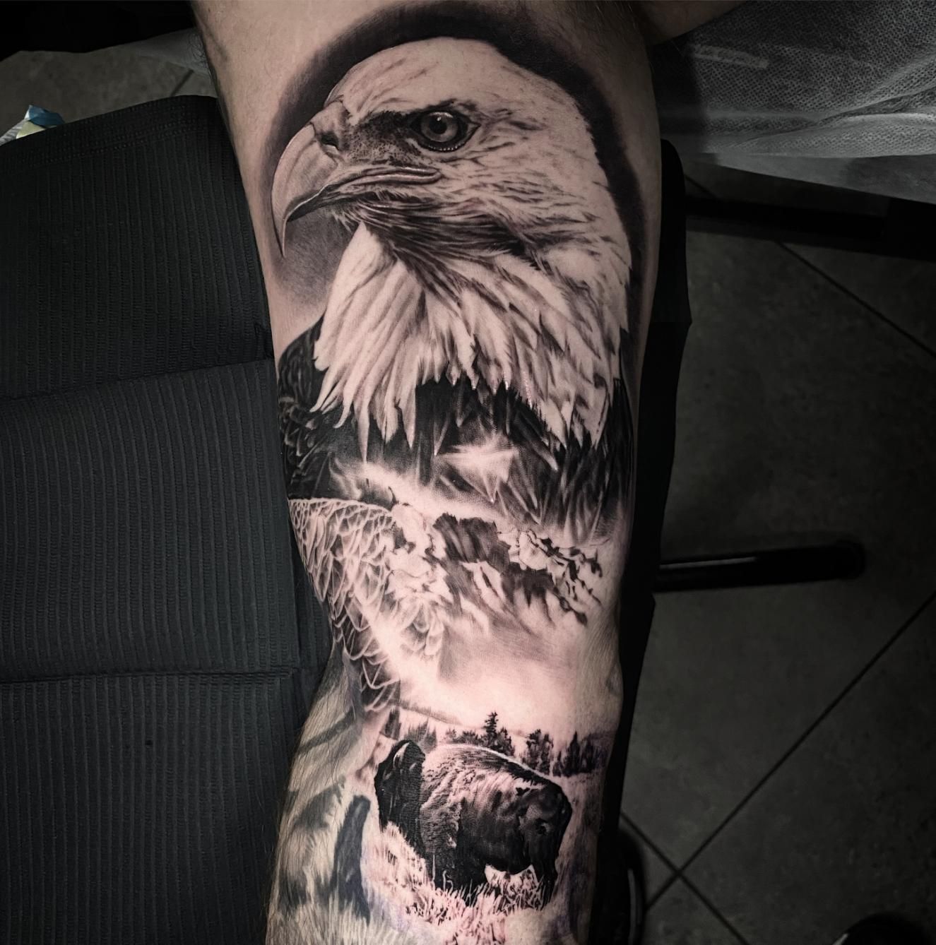 A Man Has a Tattoo of an Eagle and a Bison on His Leg — Gallery Tattoo in Medowie, NSW