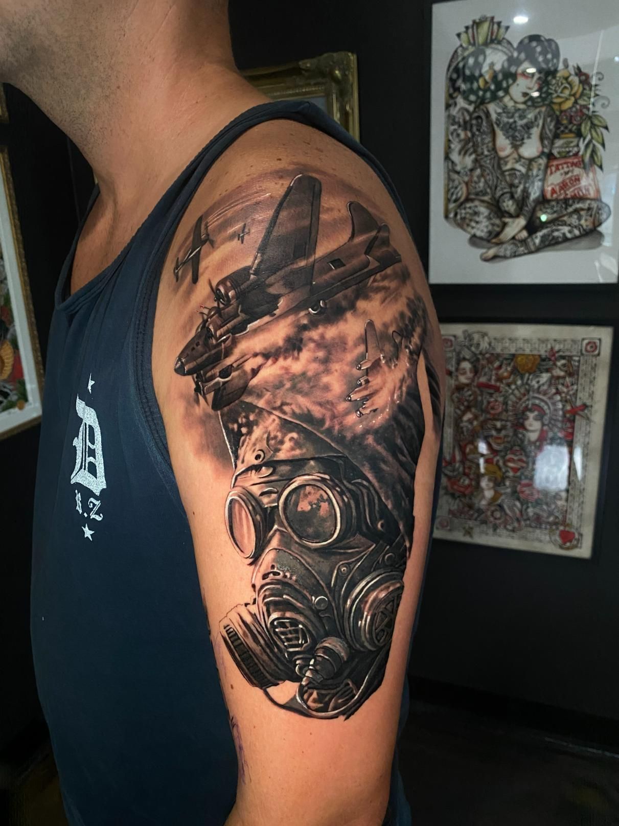 A Man Has a Tattoo of a Gas Mask on His Arm — Gallery Tattoo in Medowie, NSW