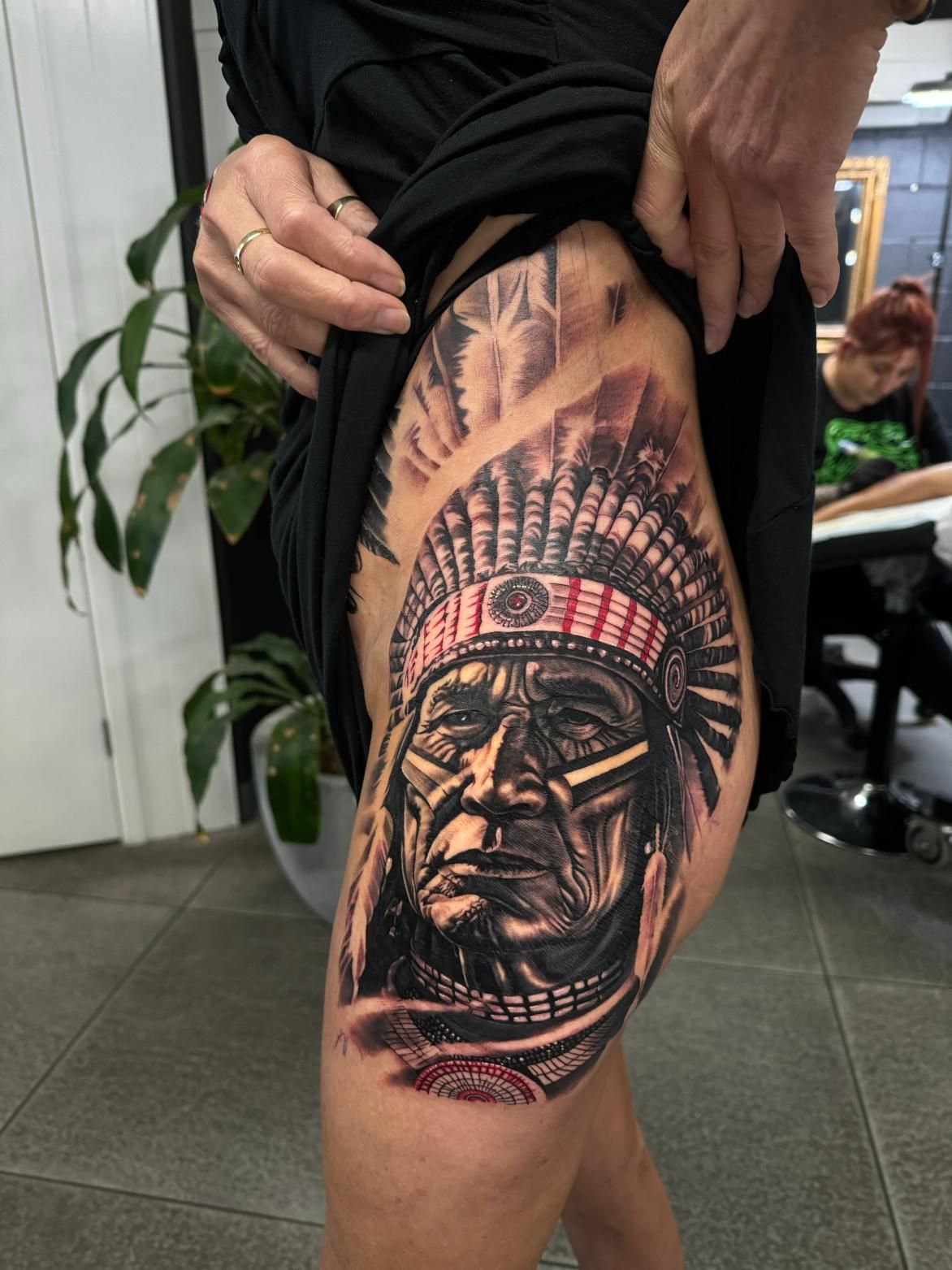 A Woman Has a Tattoo of an Indian Chief on Her Leg — Gallery Tattoo in Medowie, NSW