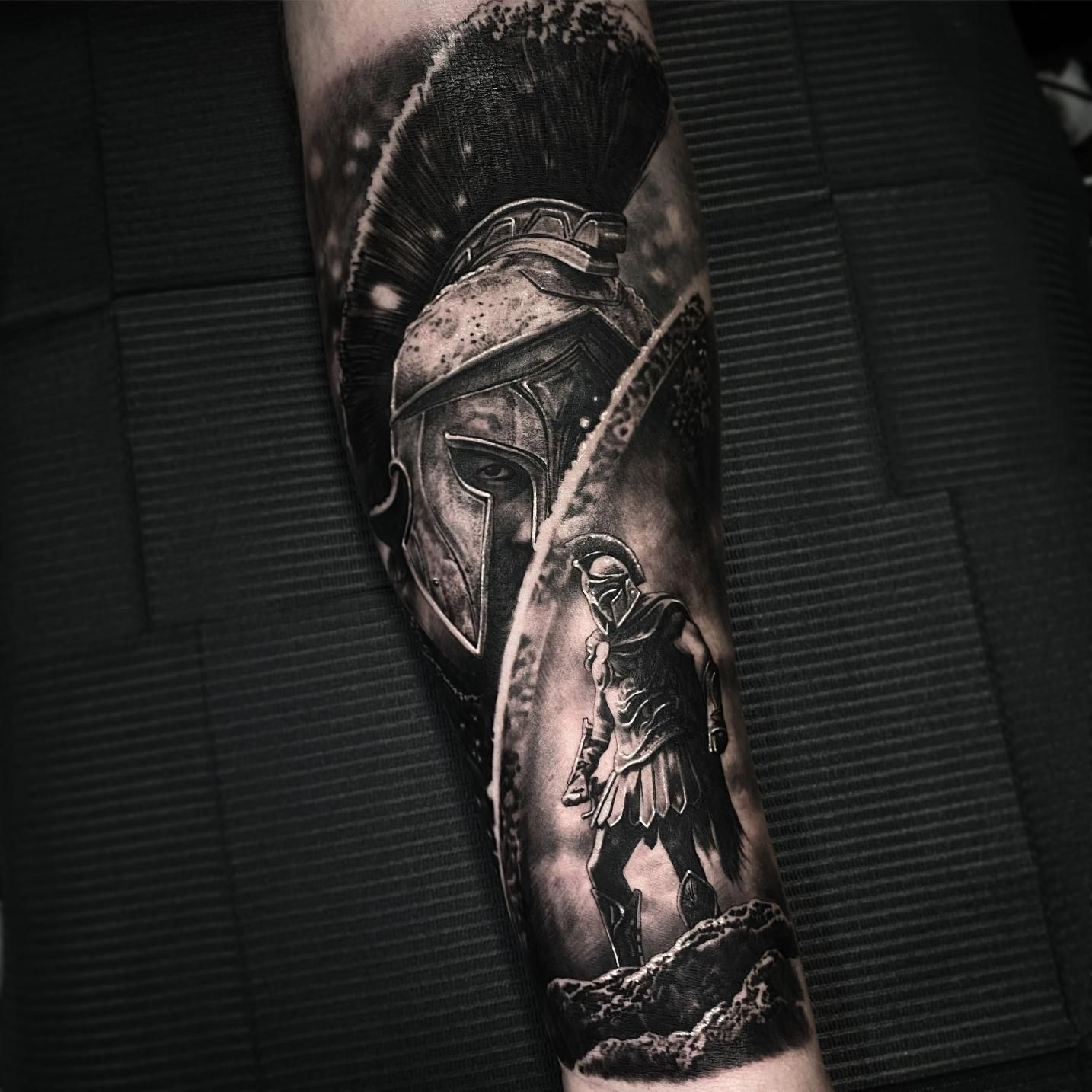 A Black and White Tattoo of a Spartan Warrior on the Forearm — Gallery Tattoo in Medowie, NSW