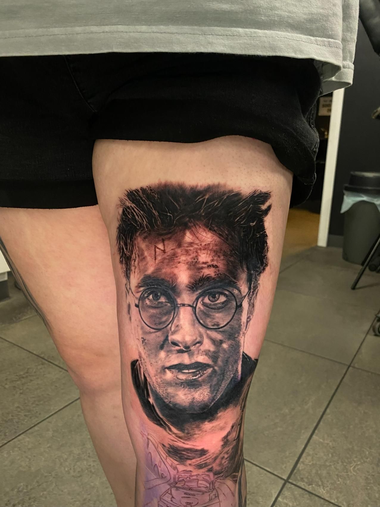 A Woman Has a Tattoo of Harry Potter on Her Leg — Gallery Tattoo in Medowie, NSW