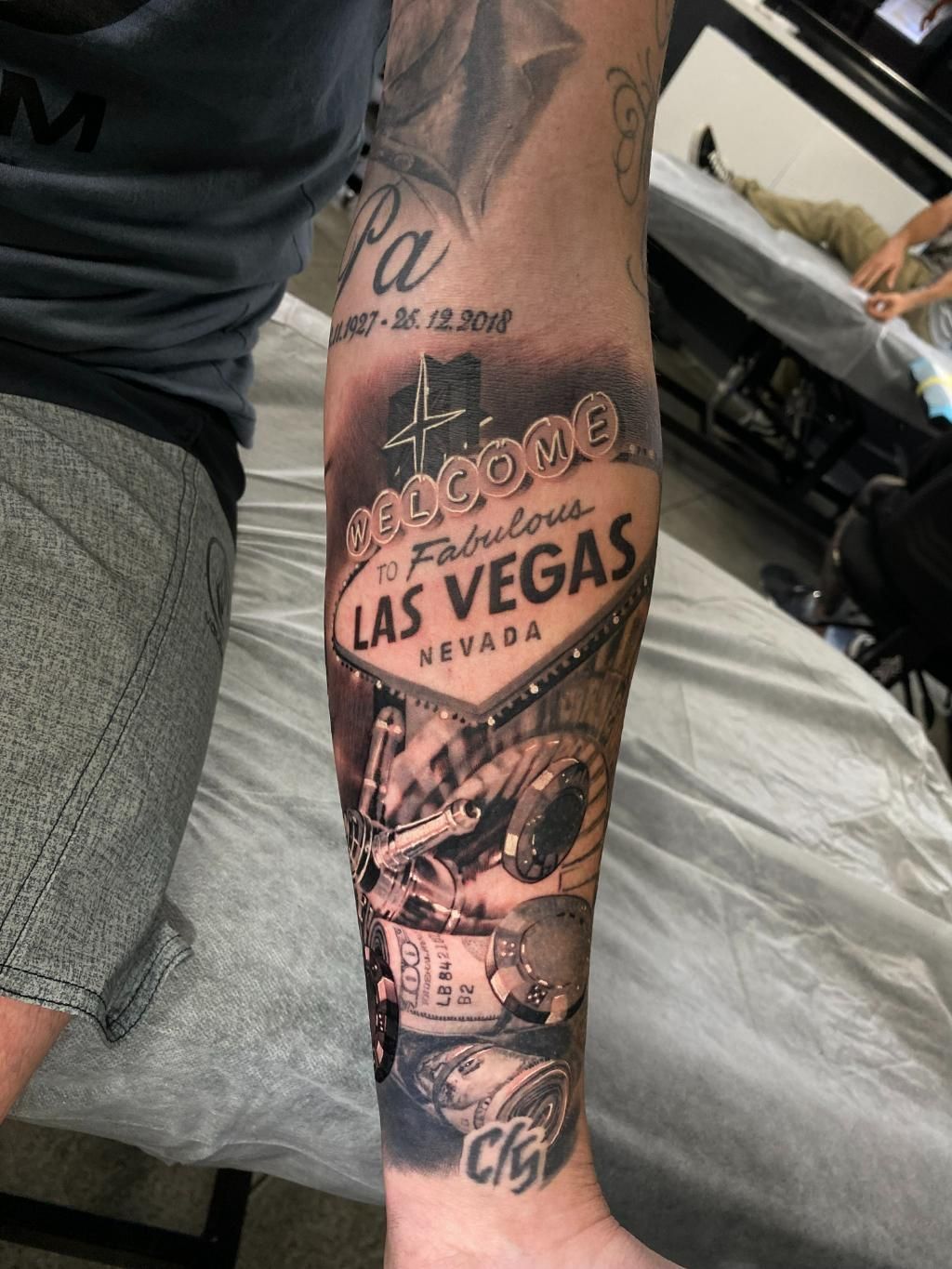 A Man Has a Tattoo of the Las Vegas Sign on His Arm — Gallery Tattoo in Medowie, NSW