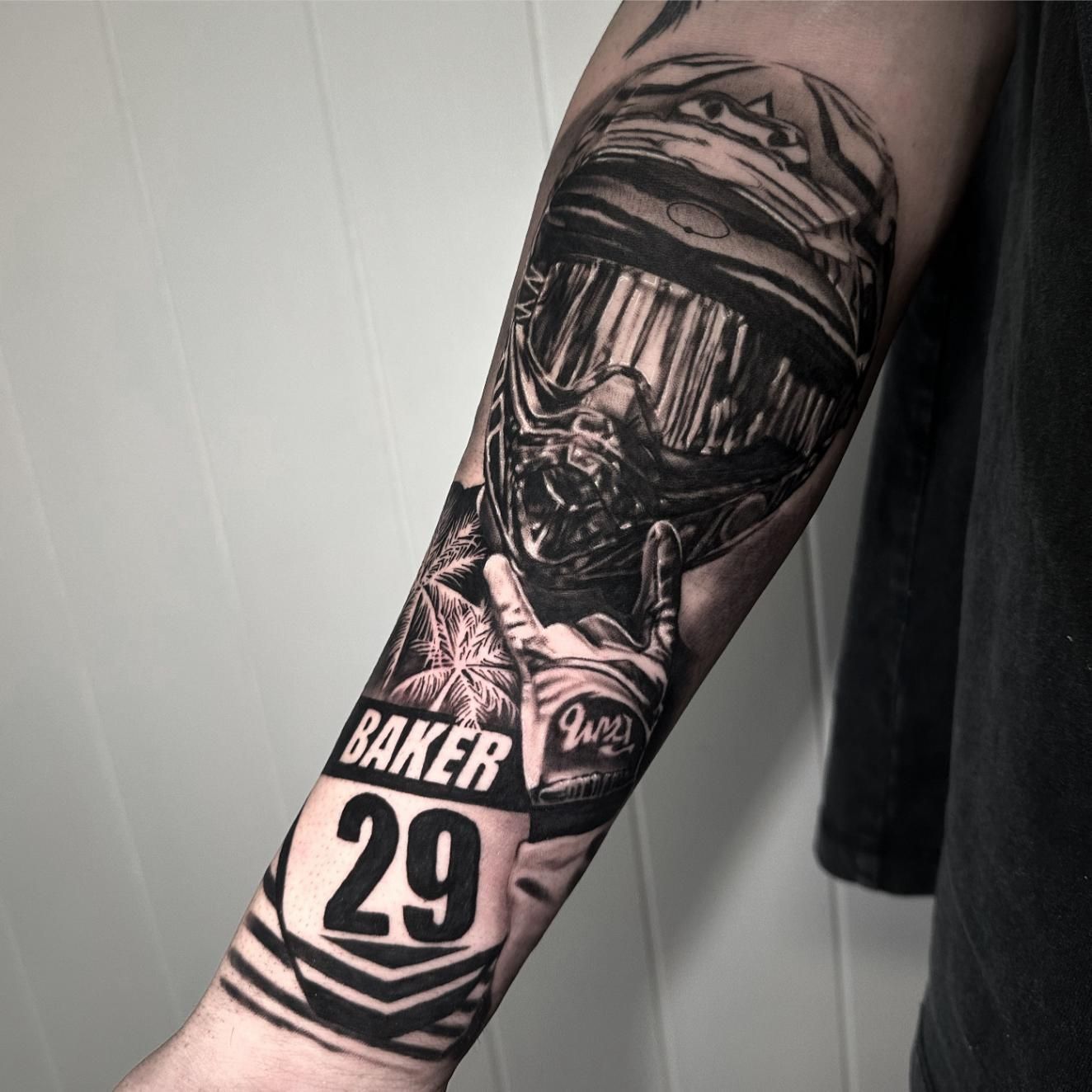 A Man Has a Tattoo on His Forearm That Says Baker 29 — Gallery Tattoo in Medowie, NSW