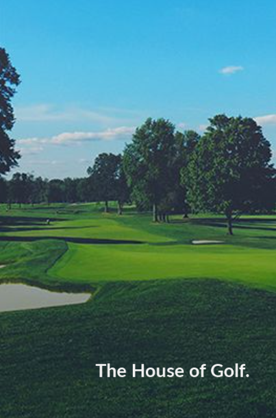 Green golf course with trees under a blue sky. Text: 