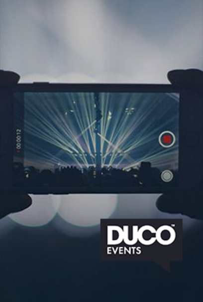 Hands holding a phone, recording a light show at an event. DUCO EVENTS logo at the bottom.