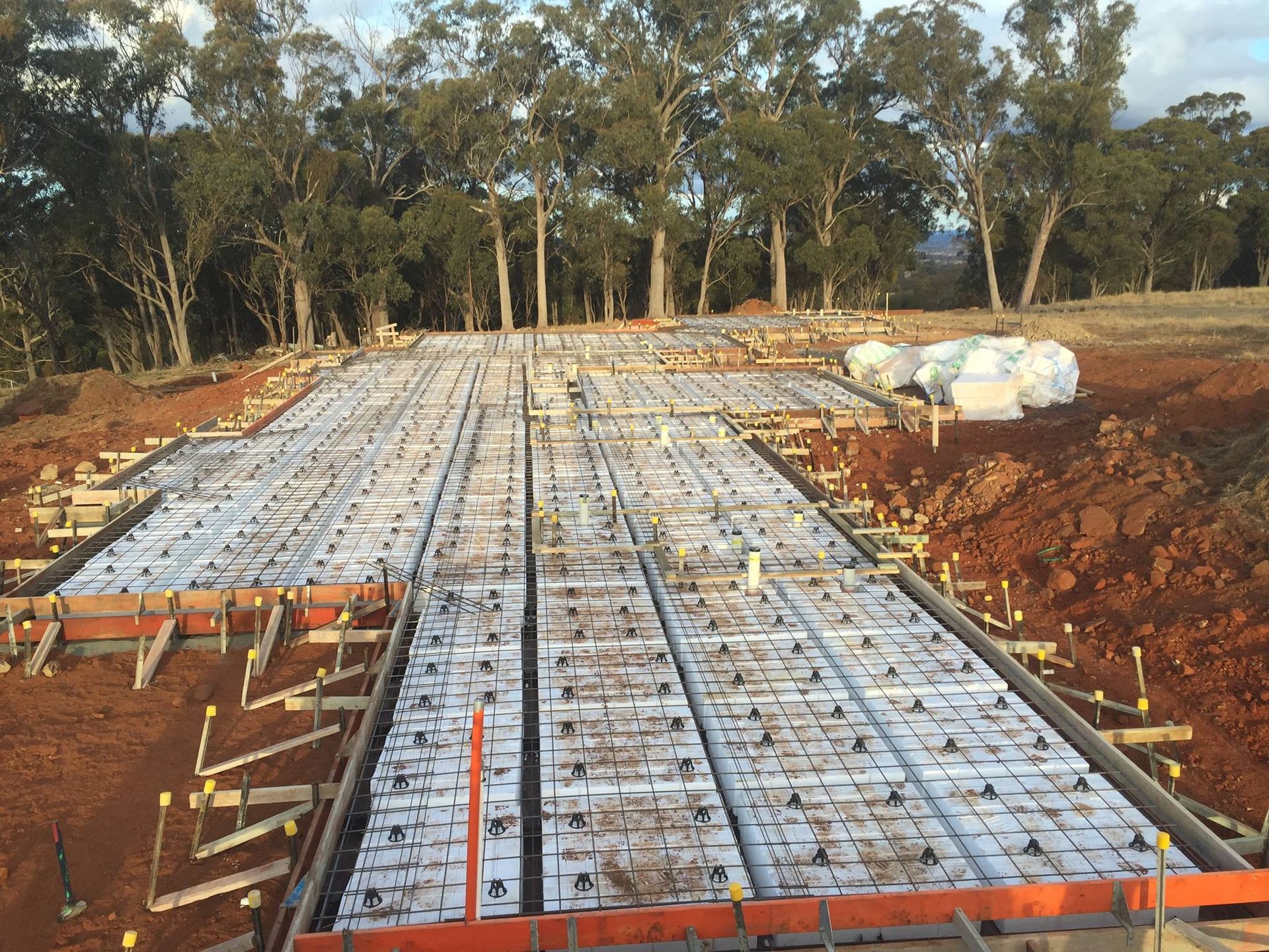 Construction Site: Wooden Forms, Rebar, and Insulation — Heritage Concrete In Uralla, NSW