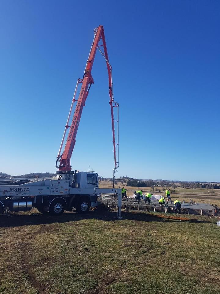 Concrete Truck Pumping Concrete — Heritage Concrete In Warialda, NSW