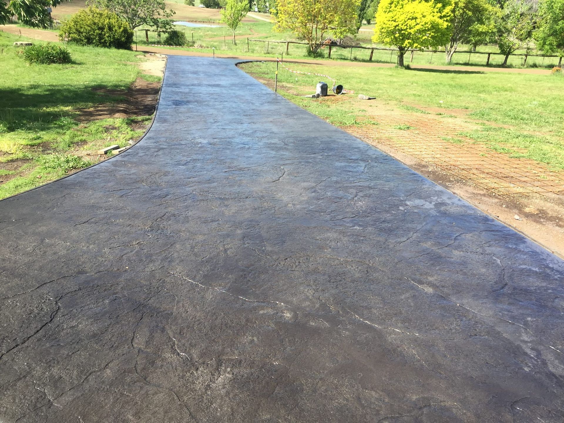 Newly Paved Asphalt Driveway Curves — Heritage Concrete In Uralla, NSW