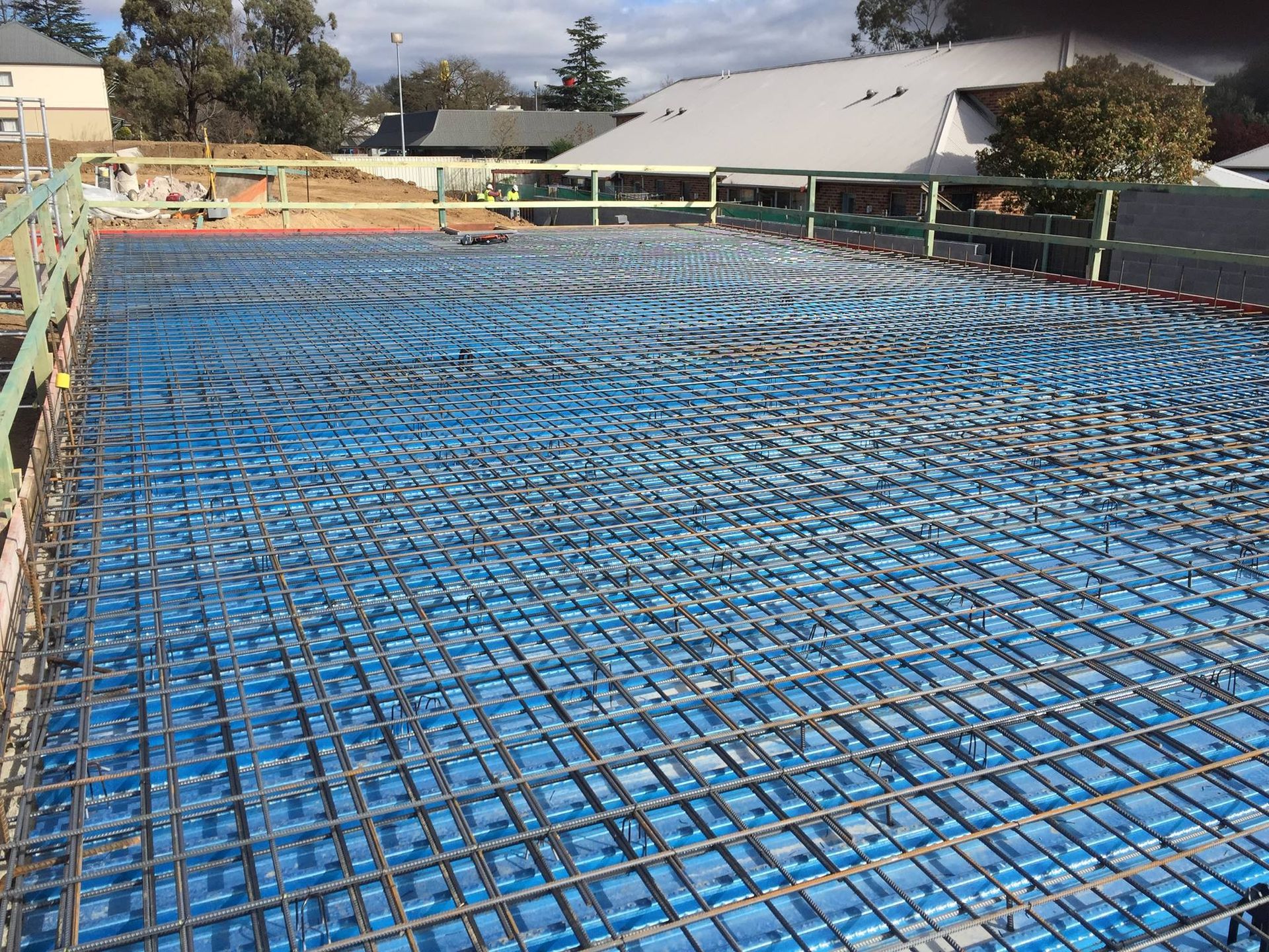 Blue Radiant Tubing Laid on Blue Insulation, Within a Rebar Grid — Heritage Concrete In Uralla, NSW