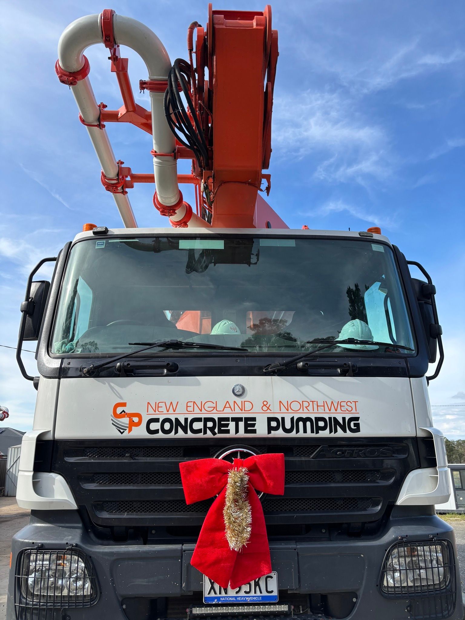 Concrete Pumping Truck With Red Boom — Heritage Concrete In Uralla, NSW