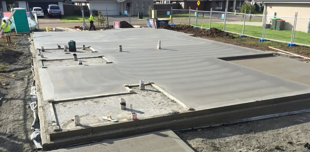 A Concrete Floor Is Being Built On A Construction Site — Heritage Concrete In Uralla, NSW