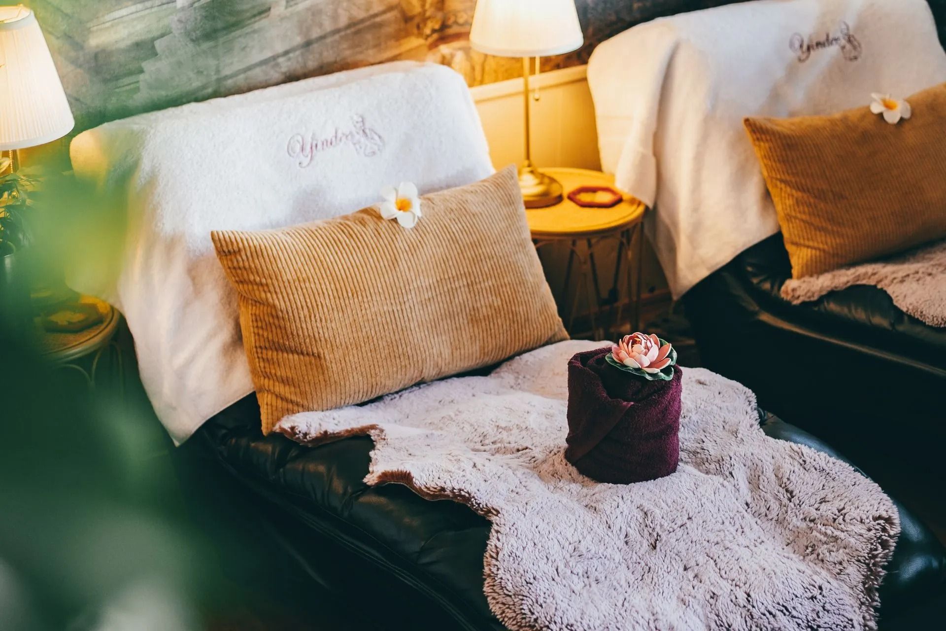 Cozy Lounge Chairs With Pillows, Blankets, a Small Table, and a Towel — Traditional Massage Services In Broadbeach, QLD