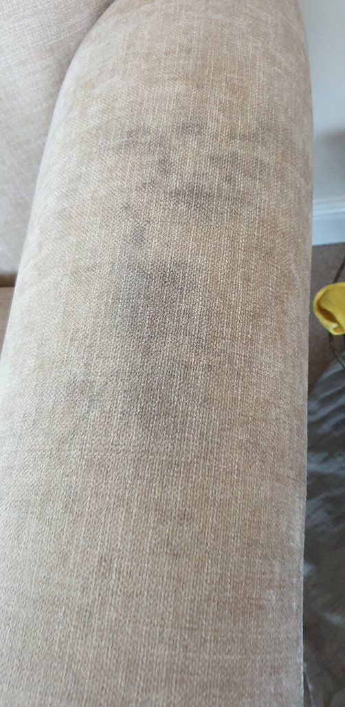 This is red wine stain on upholstery before and after cleaning